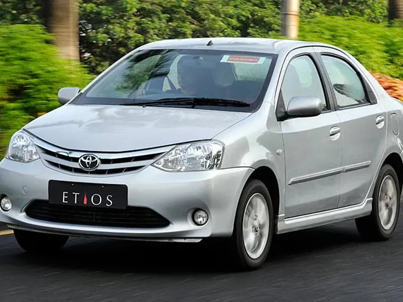 Toyota Etios taxi ready for a Mangalore Central railway station transfer